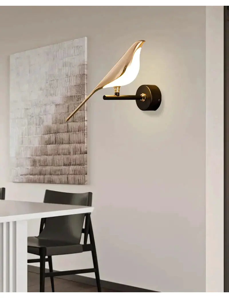 Magpie bird LED wall lamp; gold and white decorative sconce for living room or bedroom.