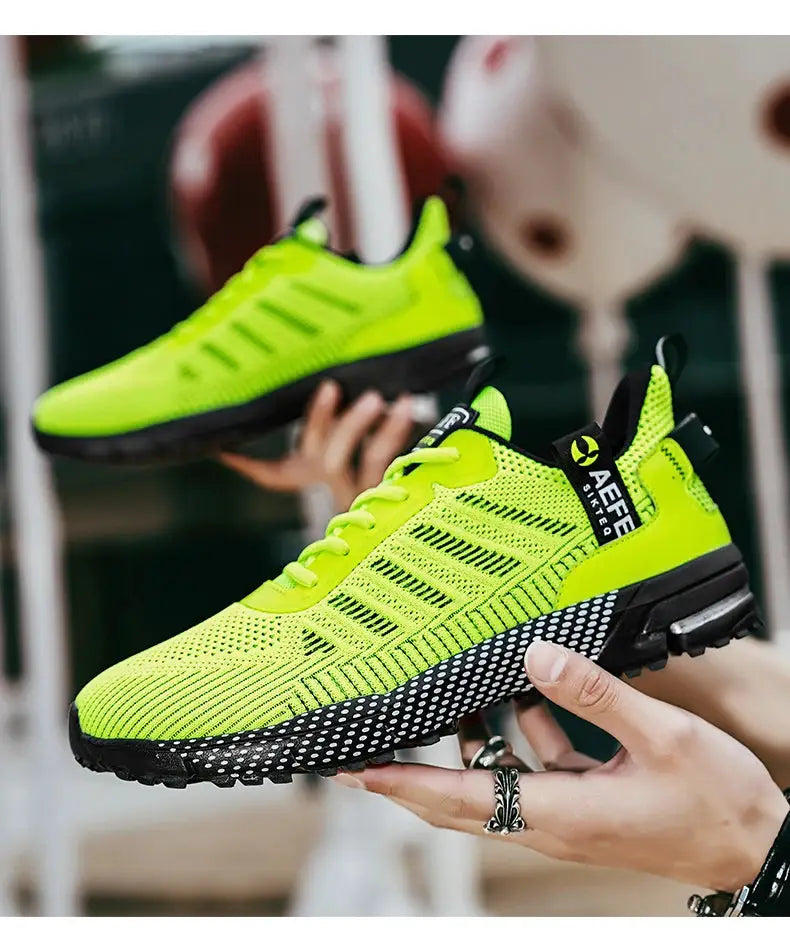 Two neon yellow-green men's running shoes with breathable mesh, lightweight outdoor sneakers, black sole