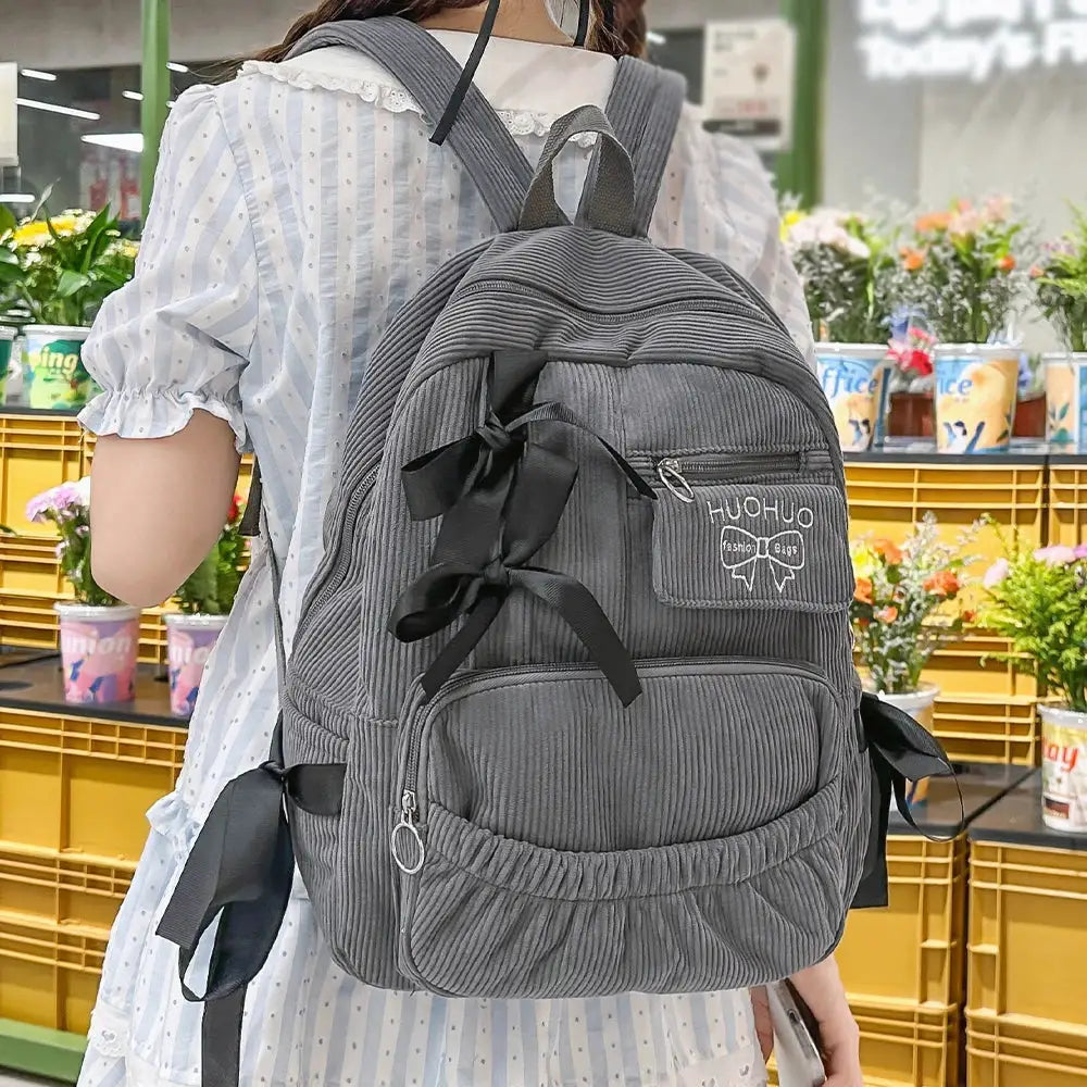 Backpack HUOHUO gray corduroy with bow accents, front zip pocket, ideal for students