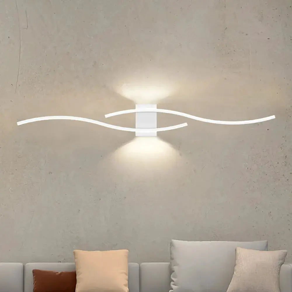Moder LED wall lamp with white curved arms, wall-mounted ambient lighting for bedroom or living room
