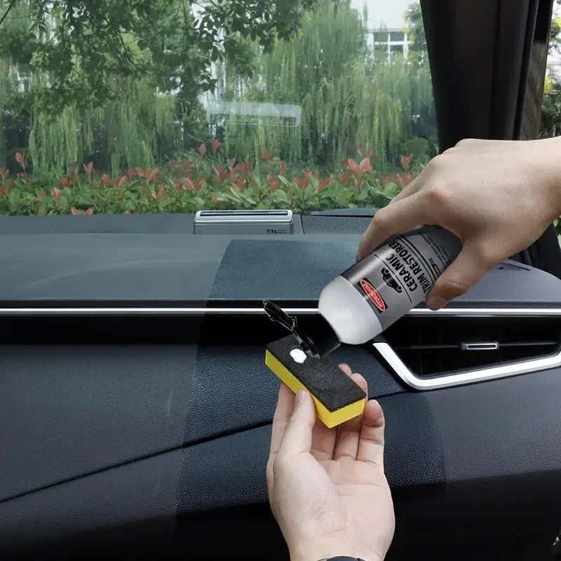 Hydroshine Ceramic Trim Restorer Gel by Simples Market applied to car dashboard plastic using a yellow sponge applicator