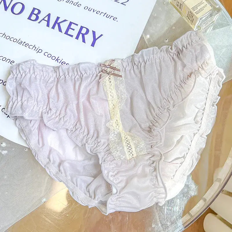 Panties by Simples Market pale pink ice silk with lace panel, bows and ruffles