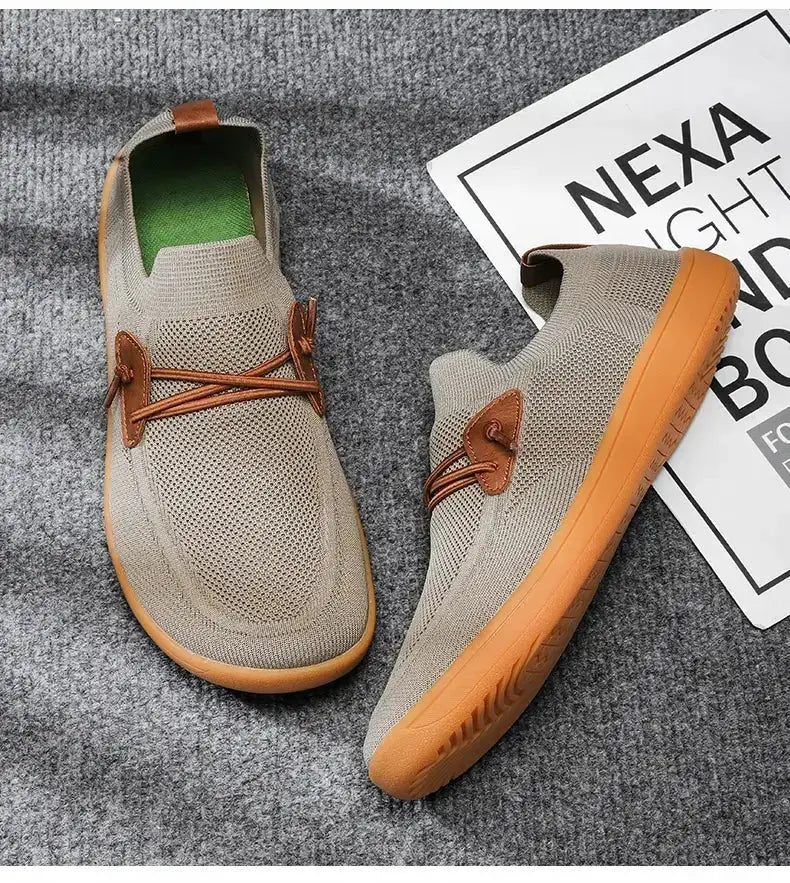 Pair of barefoot shoes, unisex wide version by Simples Market; beige knit upper, orange sole, breathable sport sneakers.