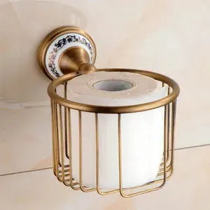 Antique brushed solid brass tissue holder with blue floral porcelain backplate and cage frame, wall-mounted