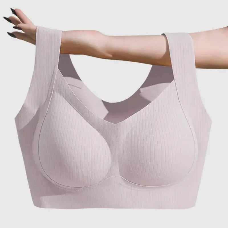 Pink ribbed one-piece bra with molded cups and wide straps