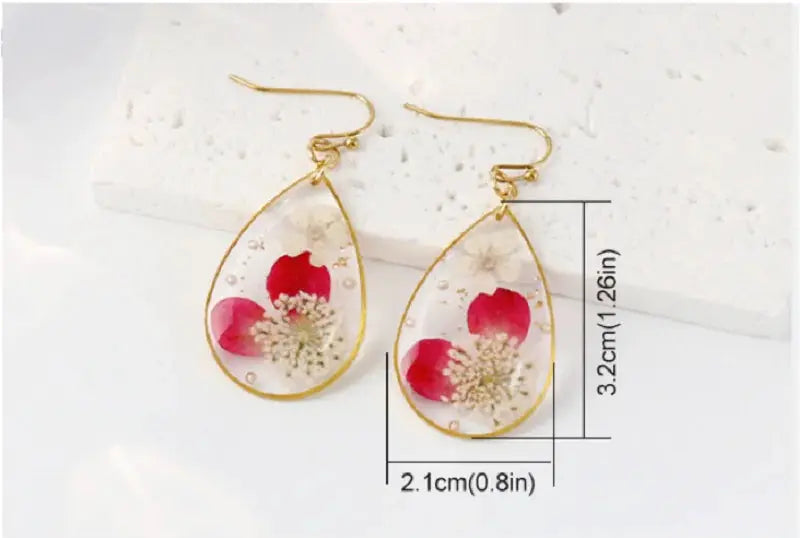 Teardrop epoxy resin earrings with colorful pressed flowers, gold-tone border, set of 2