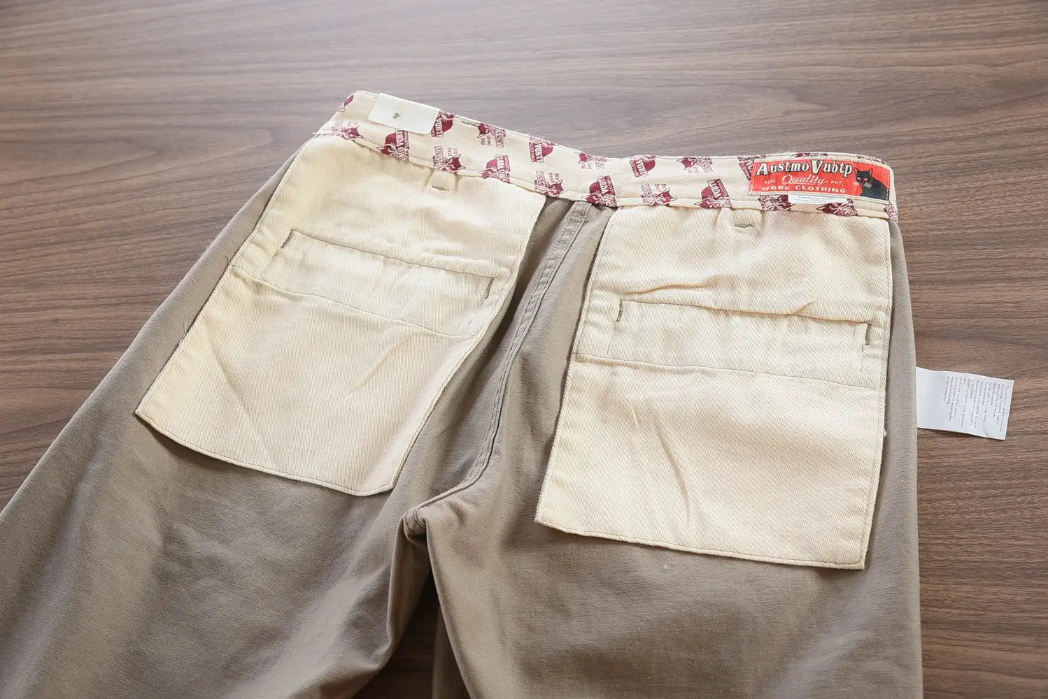 Men's 100% cotton washed chinos, brown-taupe with beige back pockets and red patterned waistband lining