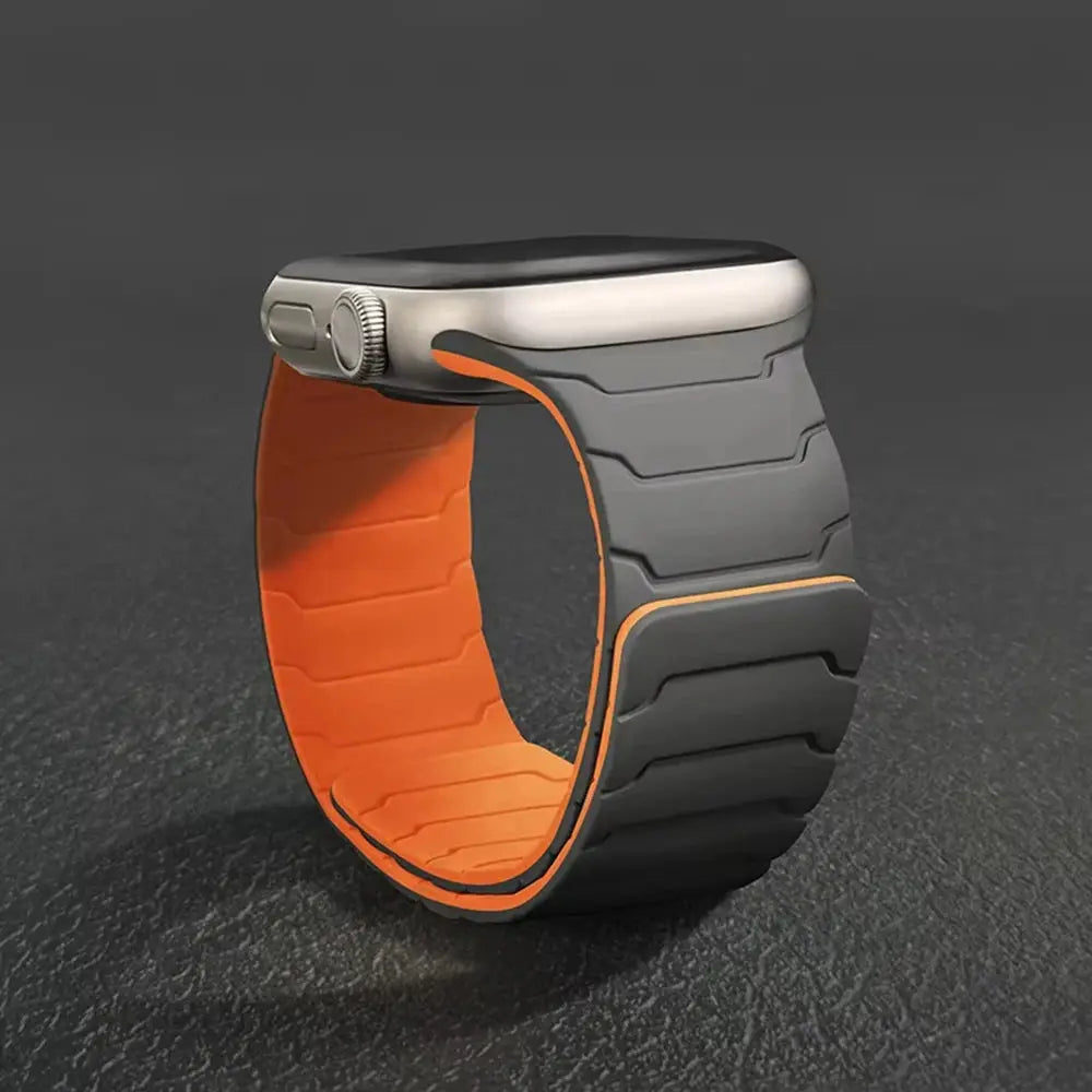Silicone magnetic Apple Watch band; gray exterior with orange interior, fits 40-49mm Apple Watch models.