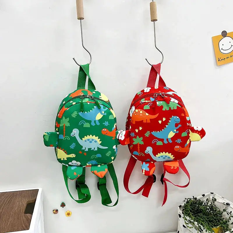 Dinosaur kids backpacks set of two, green and red with cartoon dinosaur patterns for school