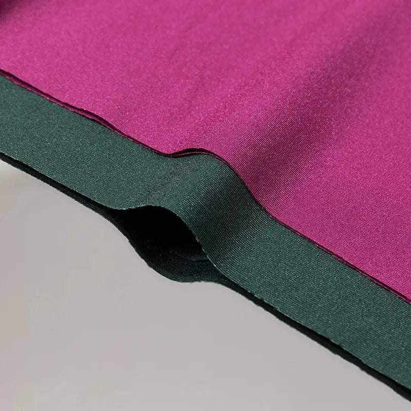 Women's high-waist panties in pink fabric with a dark green elastic waistband