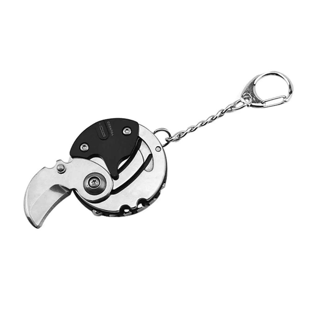 Multifunctional keychain coin tool with folding blade and hex screwdriver by Simples Market, silver and black