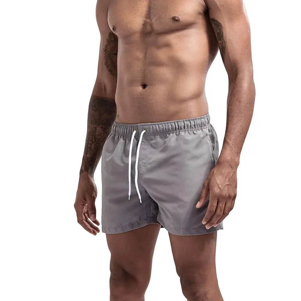 Men's gray quick-dry swim shorts with drawstring and pockets