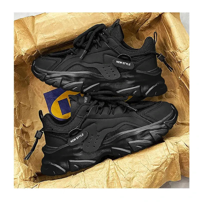 Men's black breathable thick-soled sneakers; chunky outsole and mesh upper, pair shown.