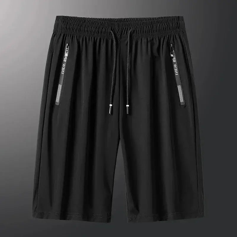Men's black plus-size gym shorts by Simples Market, elastic waist with drawstring and zip pockets, quick-dry.