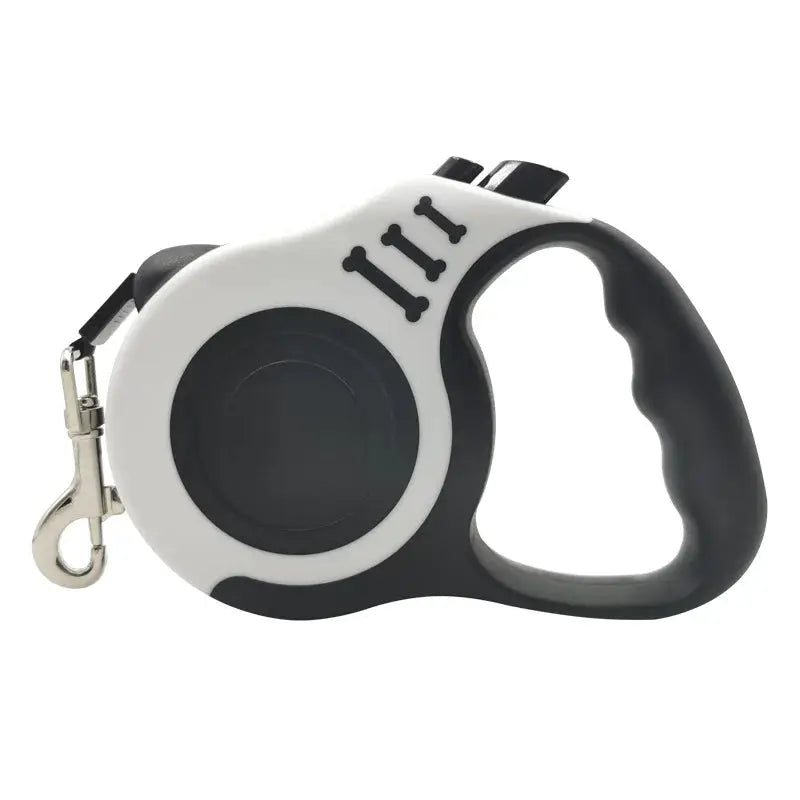 Automatic retractable dog leash in white and black with ergonomic grip and metal clip.
