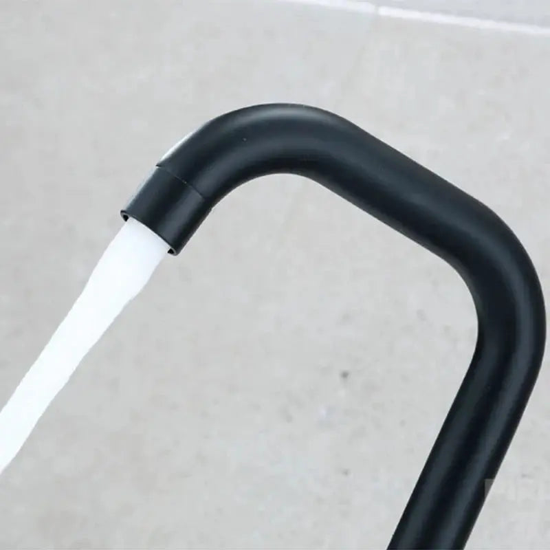 304 stainless bathroom faucet by Simples Market, black matte finish, 360° rotating, single-handle hot/cold mixer