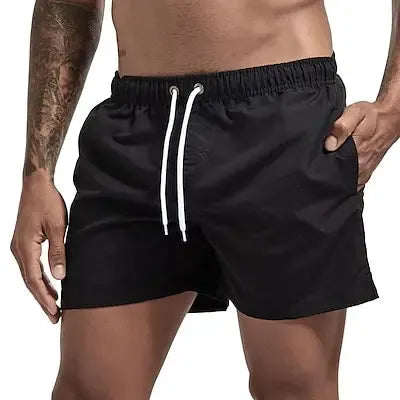 Simples Market men's black swim trunks with white drawstring, quick-dry board shorts with pockets.