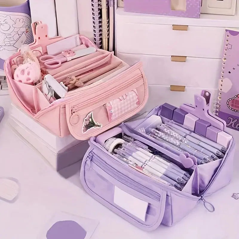 Pencil cases in pink and lavender with multiple compartments and zippers for desktop organization, 2 pieces