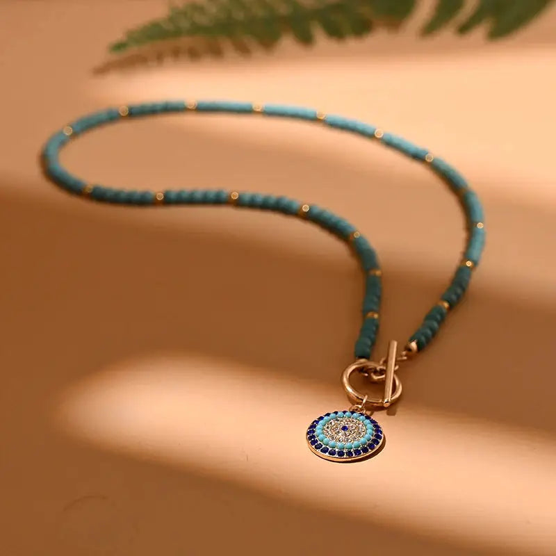 4mm turquoise stone choker necklace with round evil charm pendant