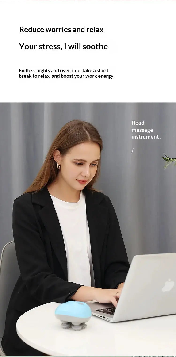 Deep scalp massager by Simples Market in blue and gray on a white table beside a laptop.