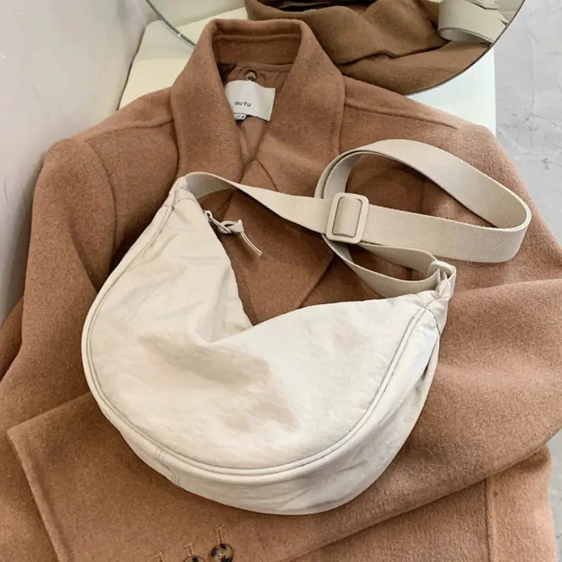 Casual nylon hobo crossbody bag, cream color with beige strap, spacious design
