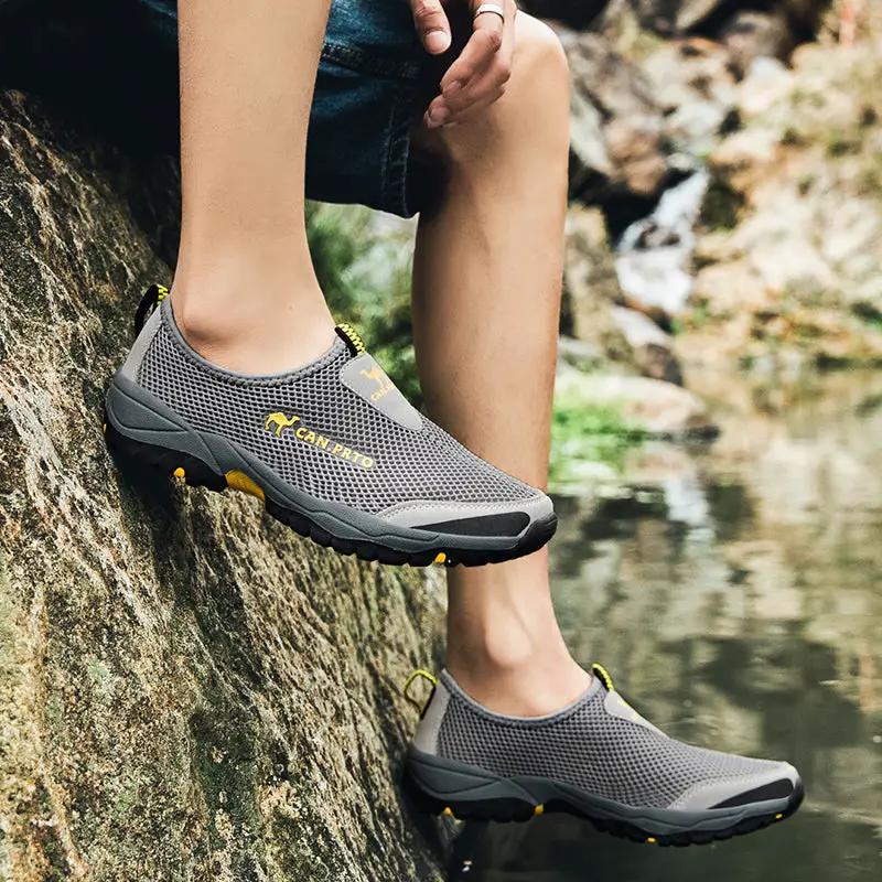 Men's mesh outdoor slip-on sneakers by Simples Market, gray with yellow accents, pair