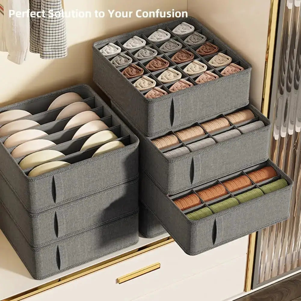 Closet underwear organizer storage boxes; gray fabric foldable drawers with divider compartments for socks and belts.