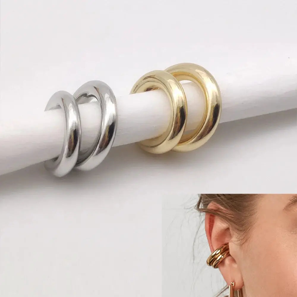 Minimalist ear cuffs set of four in gold and silver tones; round geometric ear clips