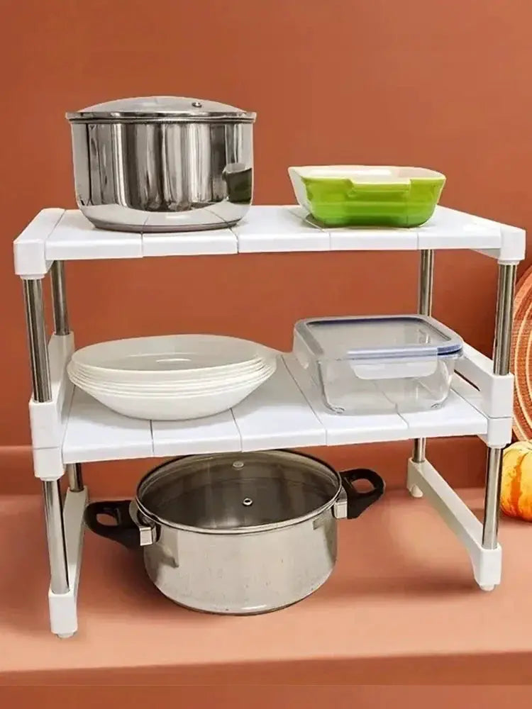 Simples Market stackable storage rack with three white shelves and metal posts, holding pots, bowls and containers