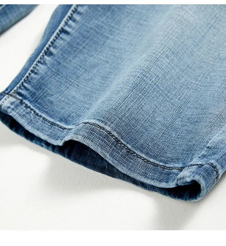 Men's denim shorts, classic slim fit, light blue stretch denim.