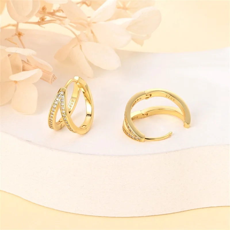 Gold-tone hoop earrings with pave crystals; two styles, pair