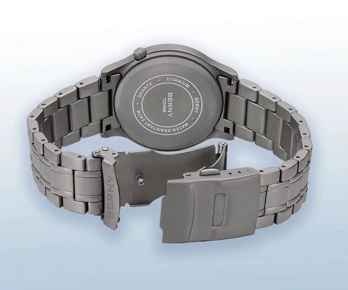 BERNY titanium men's field watch with grey metal bracelet; back displays QUARTZ, TITANIUM, BERNY