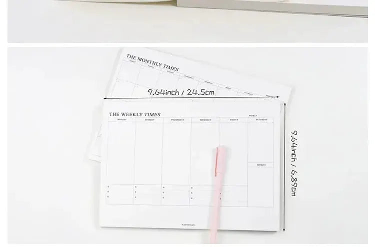 Simples Market weekly planner notebook with monthly undated agenda, white grid pages, pink pen
