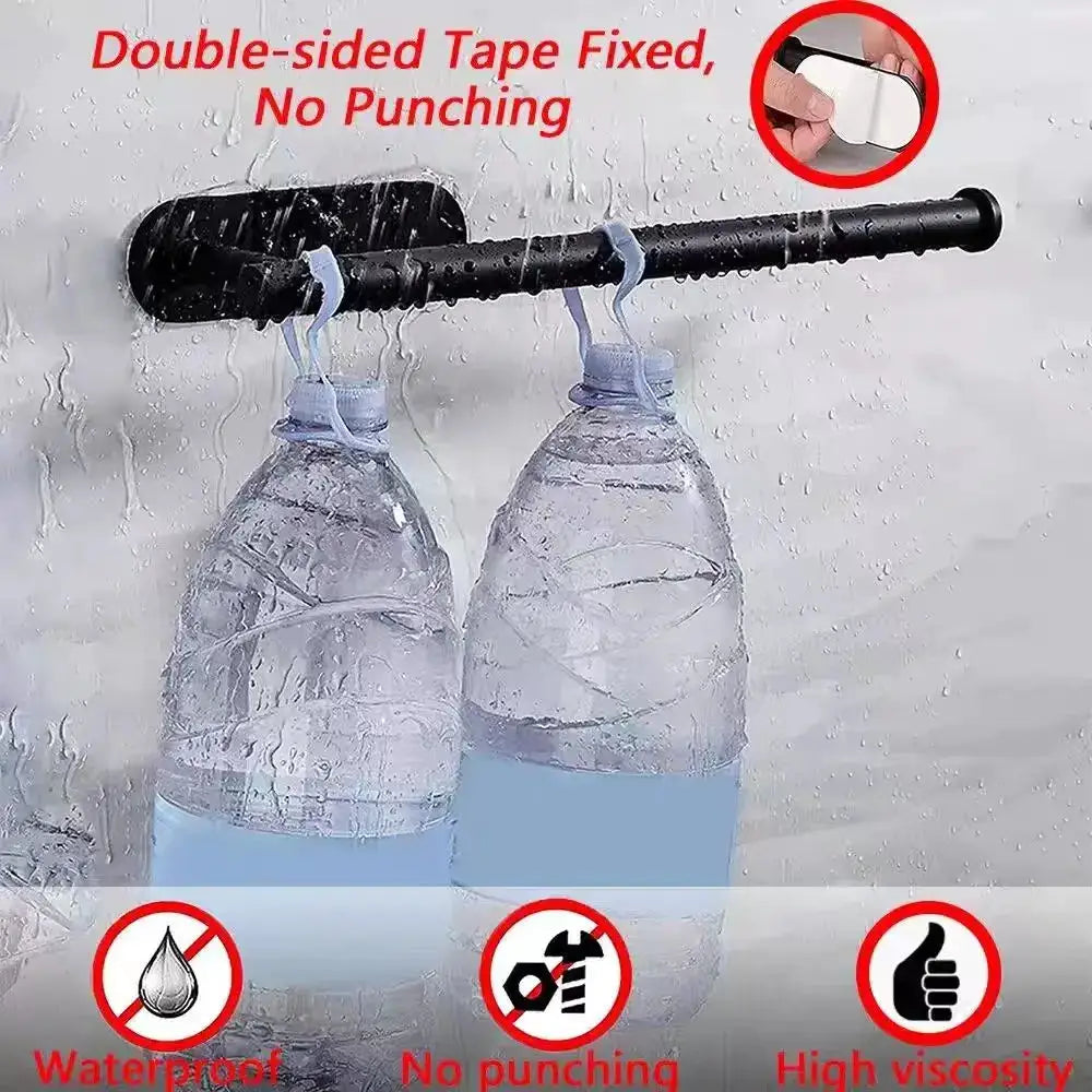 Simples Market black adhesive kitchen paper towel holder, wall-mounted with no-punch double-sided tape.