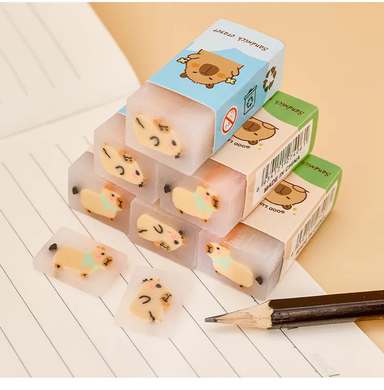 Kapibala capybara erasers by Simples Market; pastel cartoon erasers in clear mini plastic cube packaging