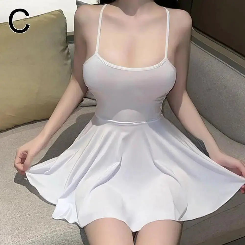 White women's spaghetti-strap pleated mini dress with a fitted bodice and flared skirt