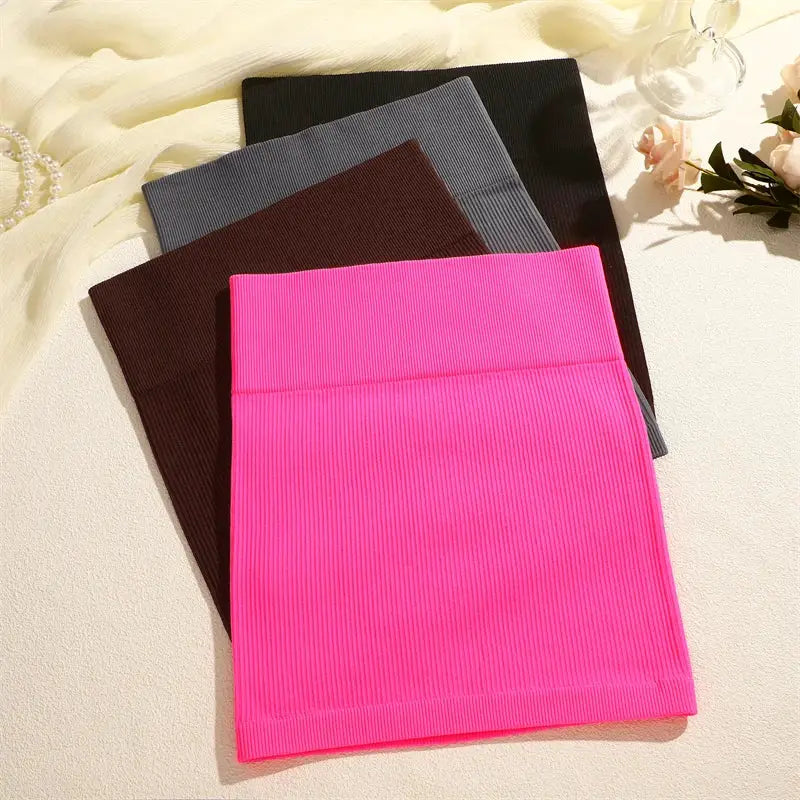 Women ribbed high-waist mini skirts, set of 4 in pink, brown, gray and black; soft stretchy knit.