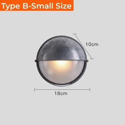 Outdoor retro LED wall lamp, round metal sconce by Simples Market with glass half-globe, IP65 waterproof