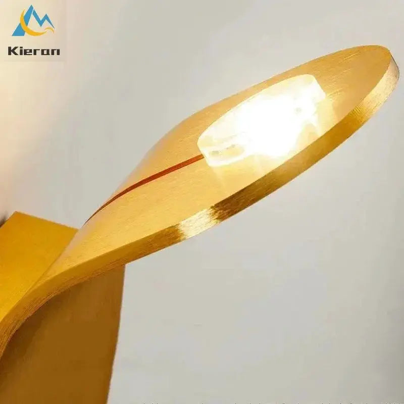 Skateboard-style LED wall lamp in warm wood finish, Nordic modern design; Kieran logo visible