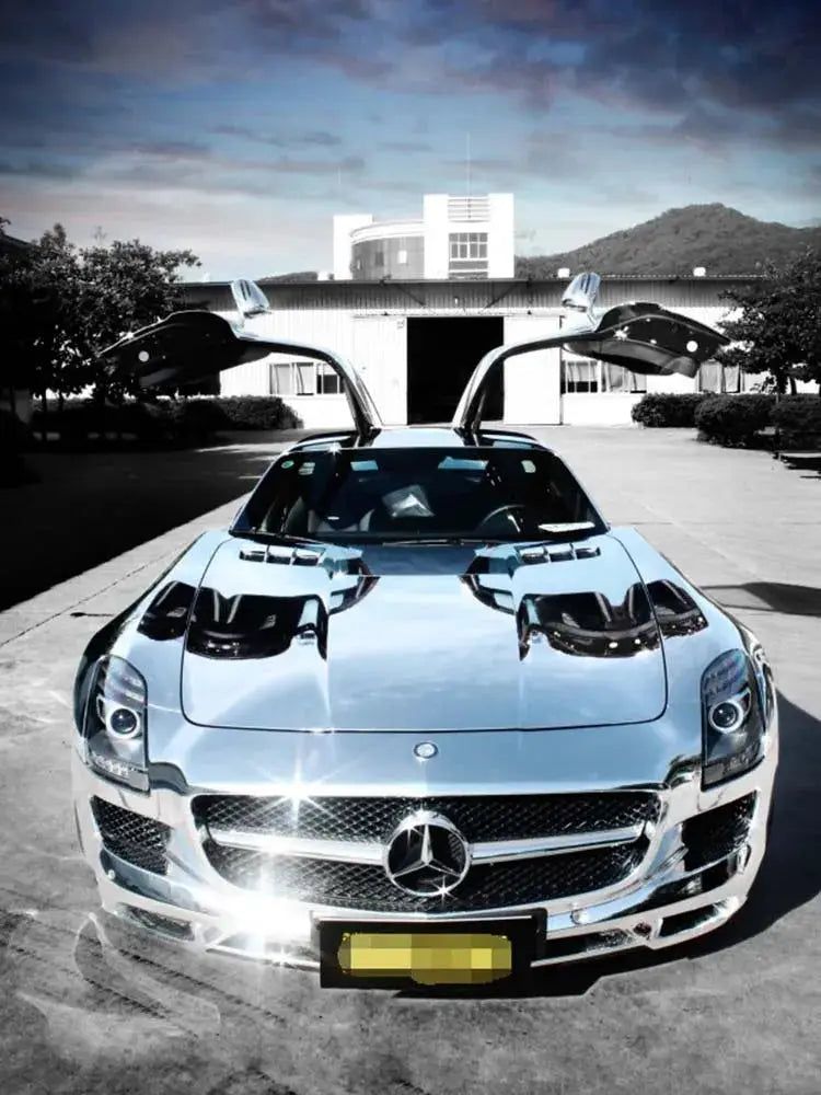 Chrome vinyl car wrap film by Simples Market on a silver Mercedes sports car