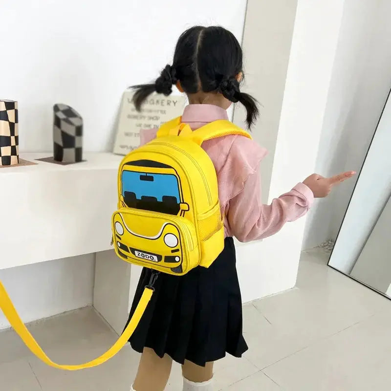Kids yellow police car schoolbag by Simples Market with blue windshield front pocket