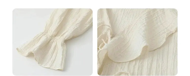 CHIC VEN women's cream textured shirt with ruffled edges and puffed sleeve cuffs
