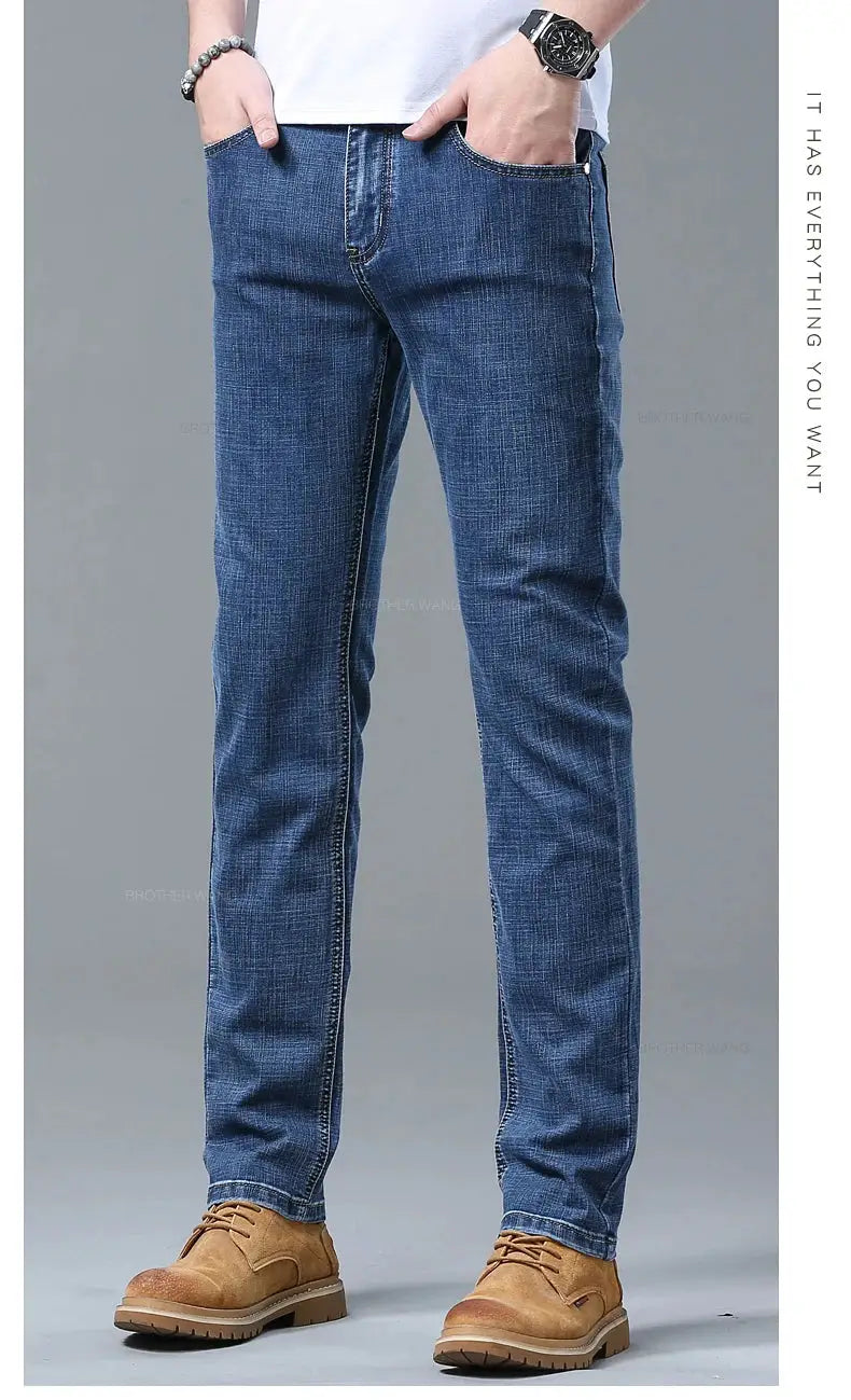 Spring men's light blue slim-fit jeans with stretch denim for casual wear