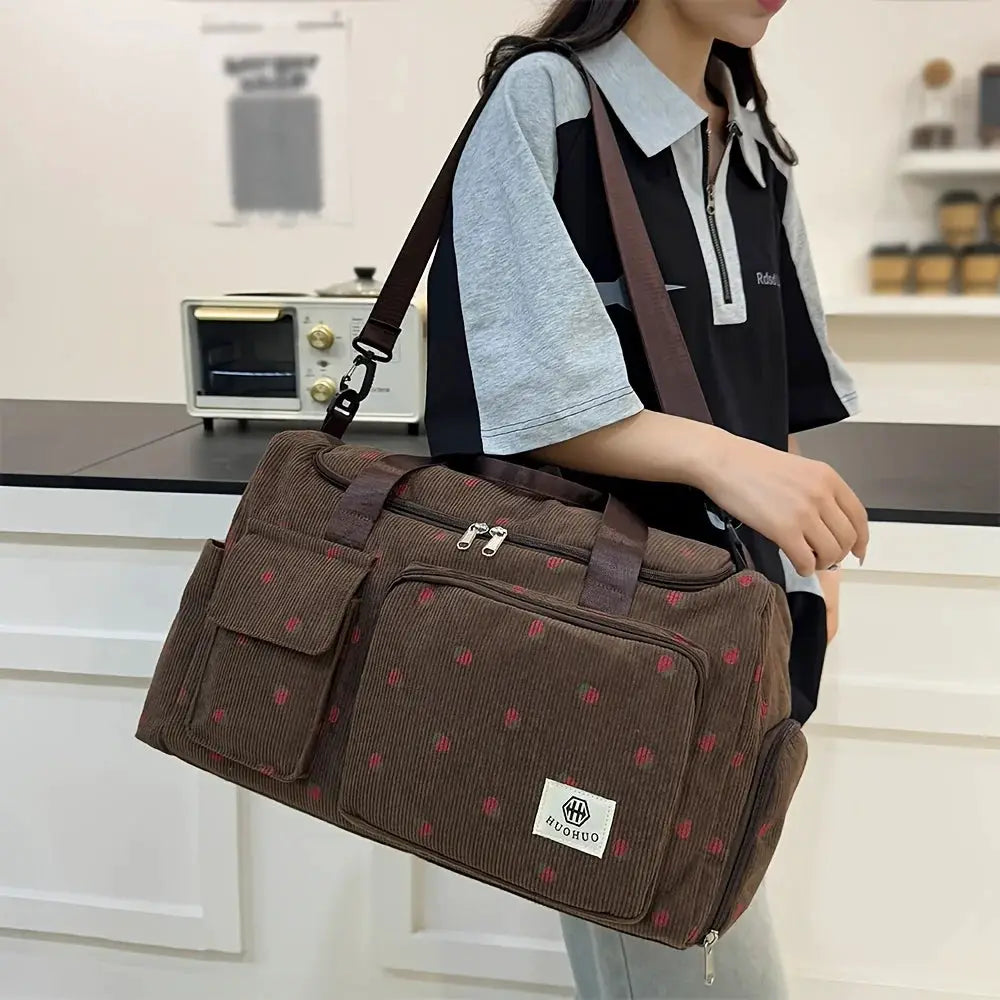 Strawberry-pattern brown corduroy travel bag with multiple pockets and crossbody strap by Simples Market
