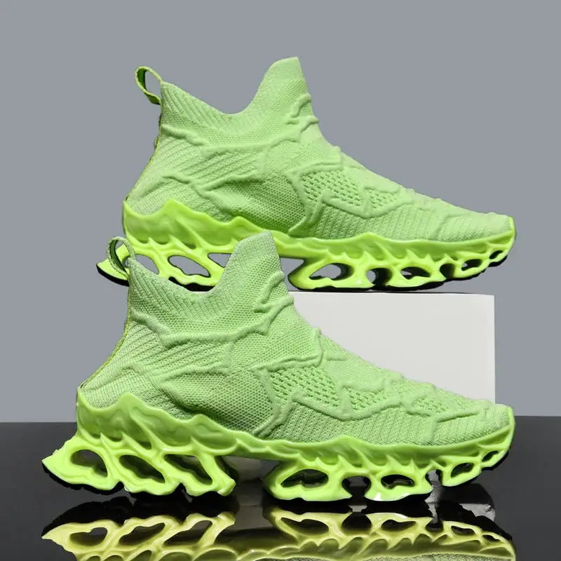 Pair of men's neon lime knit sneakers with hollow sculpted sole