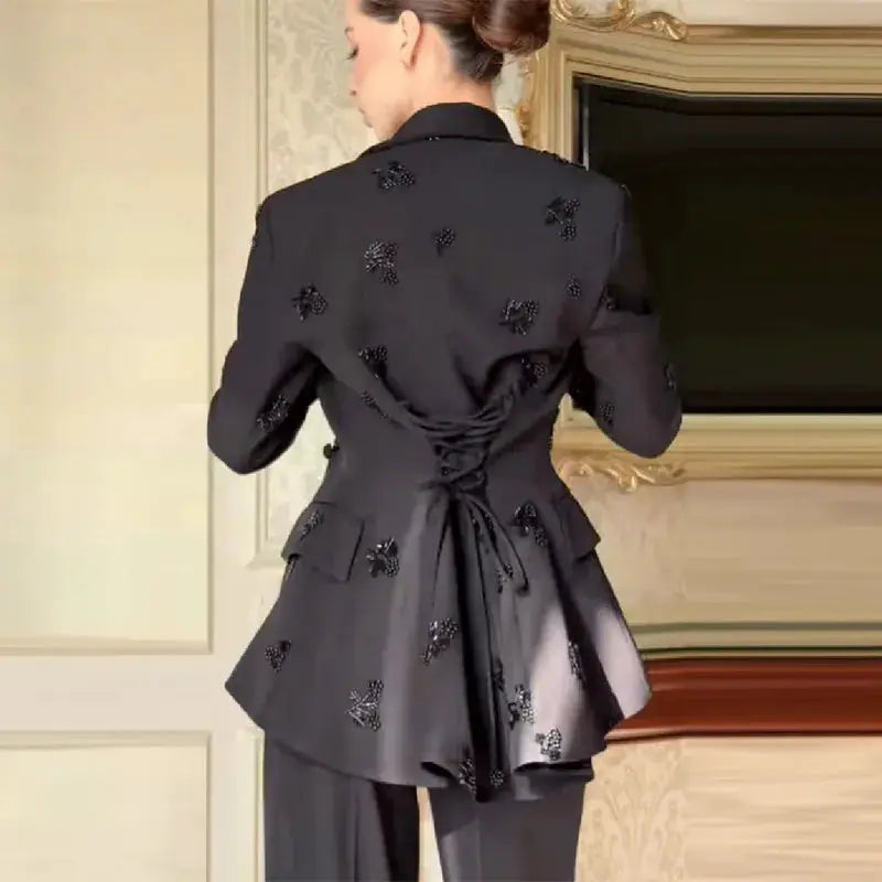 Beading black A-line blazer set with lace-up back waist and peplum hem, paired with straight pants
