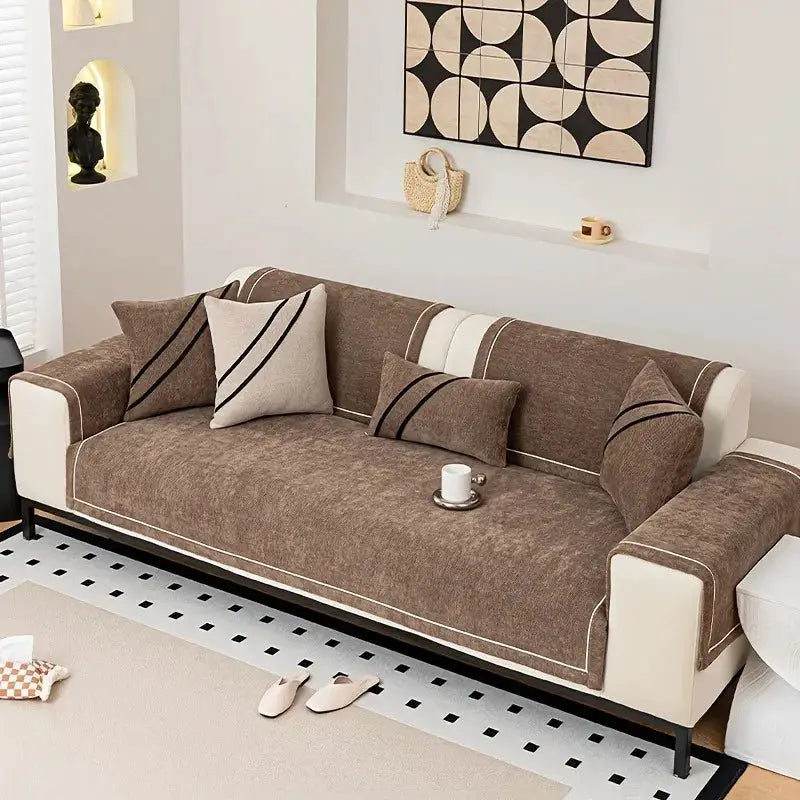 Heavy non-slip sofa protector in brown chenille with decorative stitching and beige accents.