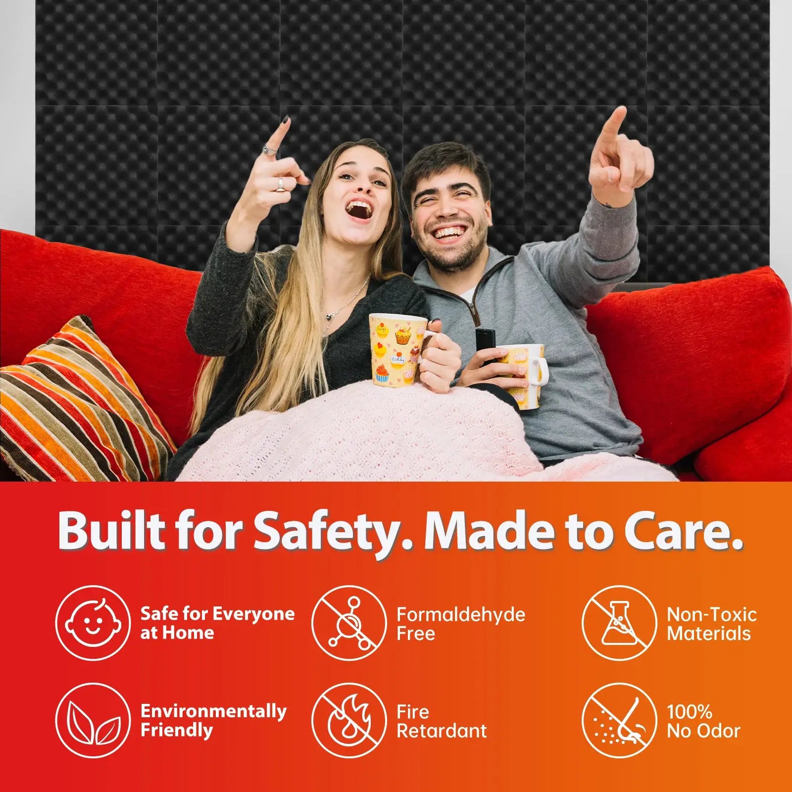 TOUO egg-trough wall acoustic foam panels in black behind a smiling couple on a red sofa
