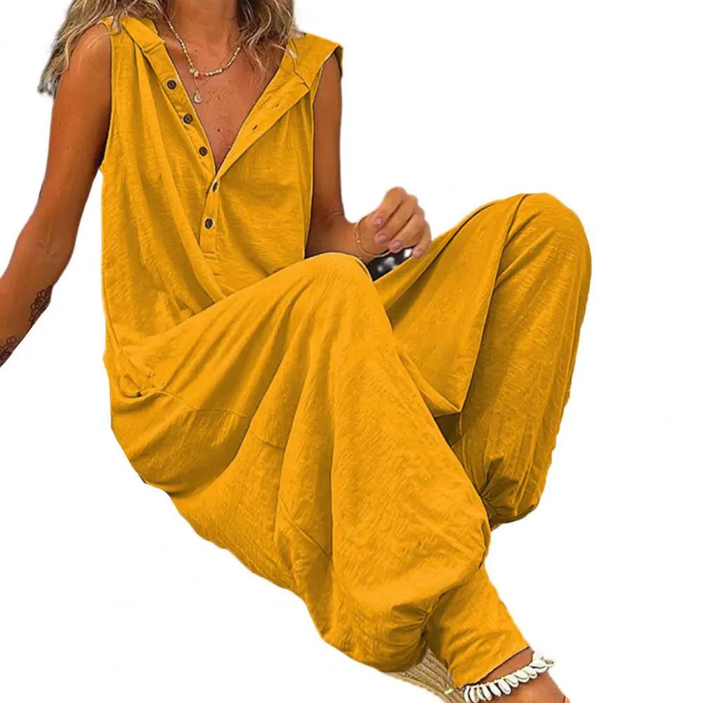 Women's mustard yellow cotton overalls with sleeveless button-front top and wide-leg pants