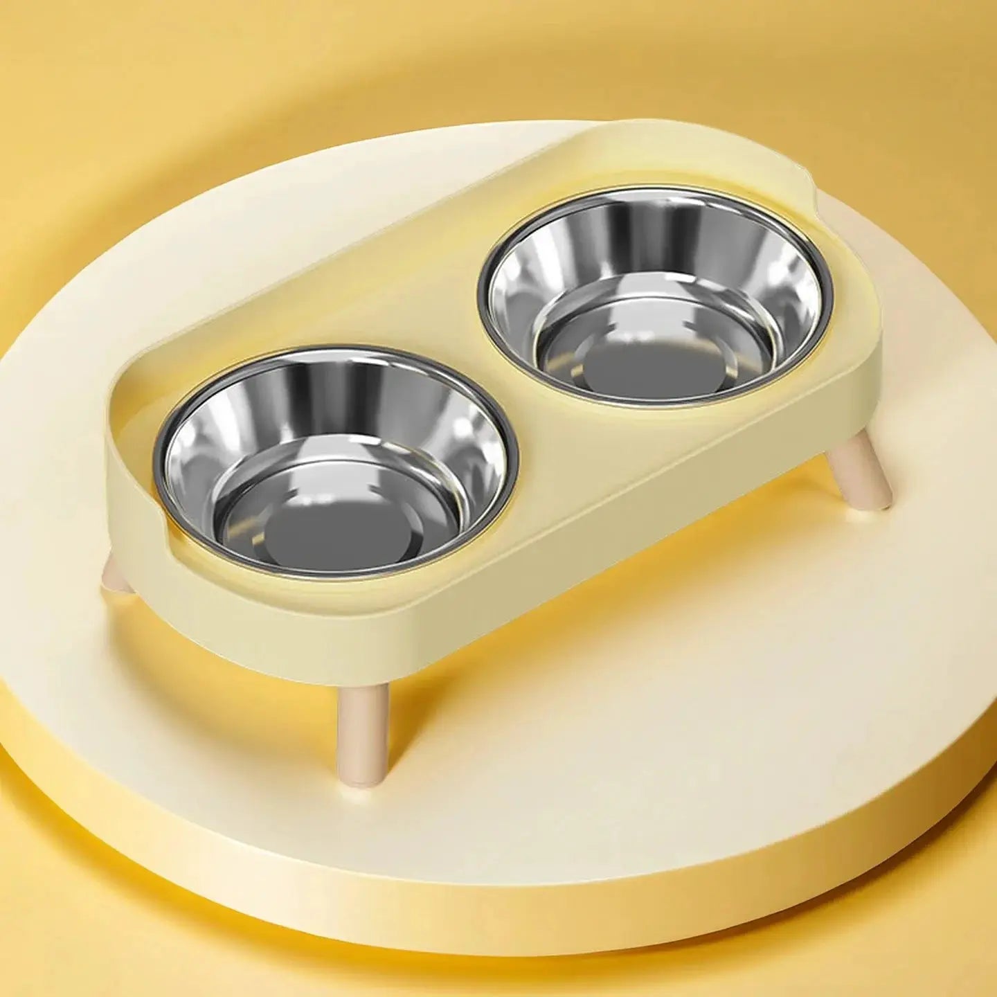 Dual stainless steel pet bowls on a cream neck-support stand for cats and dogs